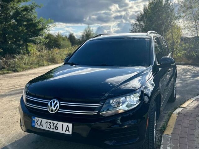 Черный Фольксваген Тигуан, объемом двигателя 2 л и пробегом 145 тыс. км за 12500 $, фото 1 на Automoto.ua