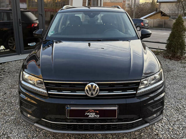 Чорний Фольксваген Тігуан, об'ємом двигуна 1.97 л та пробігом 243 тис. км за 23200 $, фото 1 на Automoto.ua