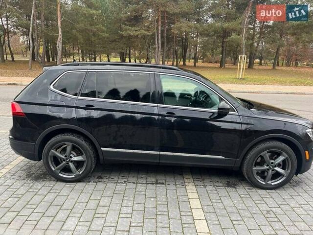 Черный Фольксваген Тигуан, объемом двигателя 1.98 л и пробегом 160 тыс. км за 18000 $, фото 1 на Automoto.ua