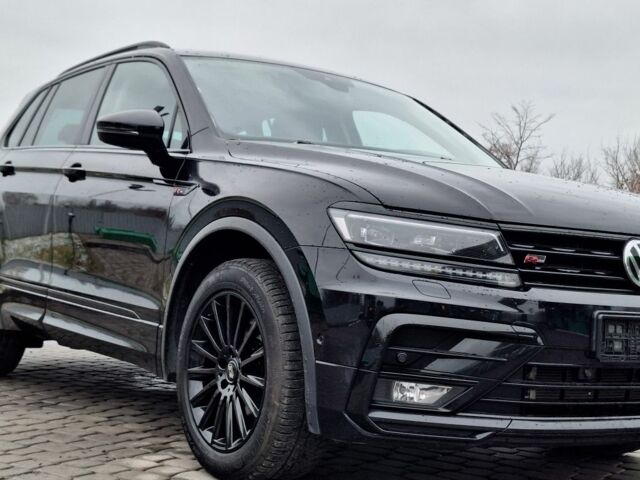 Черный Фольксваген Тигуан, объемом двигателя 2 л и пробегом 170 тыс. км за 29600 $, фото 1 на Automoto.ua