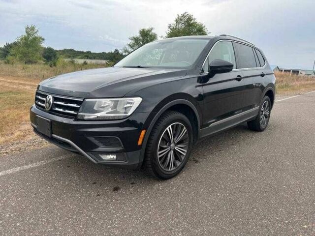 Чорний Фольксваген Тігуан, об'ємом двигуна 2 л та пробігом 71 тис. км за 7000 $, фото 1 на Automoto.ua