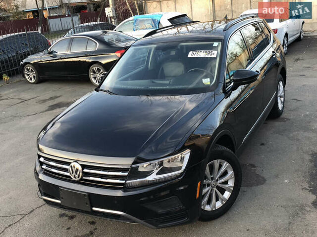 Черный Фольксваген Тигуан, объемом двигателя 2 л и пробегом 188 тыс. км за 12890 $, фото 1 на Automoto.ua
