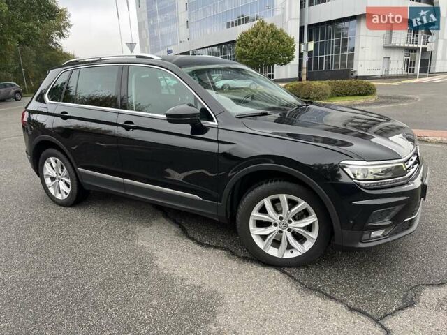 Чорний Фольксваген Тігуан, об'ємом двигуна 1.98 л та пробігом 138 тис. км за 28500 $, фото 1 на Automoto.ua