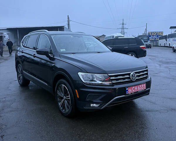 Чорний Фольксваген Тігуан, об'ємом двигуна 2 л та пробігом 162 тис. км за 18750 $, фото 1 на Automoto.ua