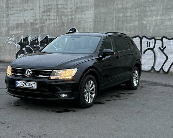 Черный Фольксваген Тигуан, объемом двигателя 1.98 л и пробегом 112 тыс. км за 14300 $, фото 1 на Automoto.ua