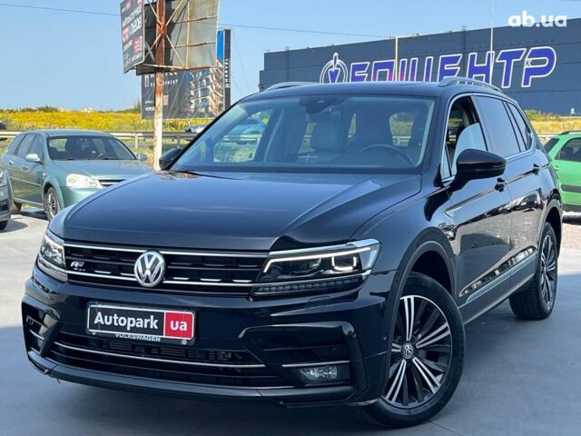 Черный Фольксваген Тигуан, объемом двигателя 2 л и пробегом 161 тыс. км за 25690 $, фото 1 на Automoto.ua