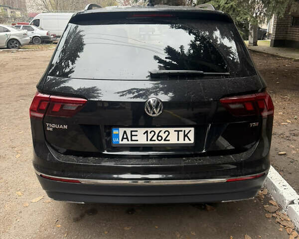 Черный Фольксваген Тигуан, объемом двигателя 1.98 л и пробегом 195 тыс. км за 16000 $, фото 1 на Automoto.ua