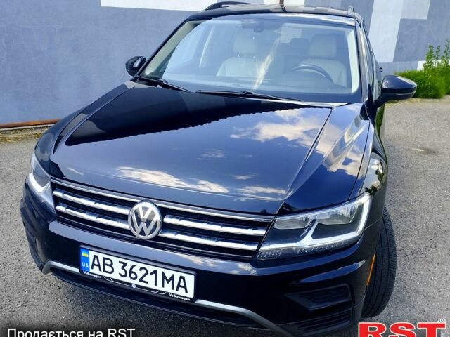 Черный Фольксваген Тигуан, объемом двигателя 2 л и пробегом 165 тыс. км за 16500 $, фото 1 на Automoto.ua