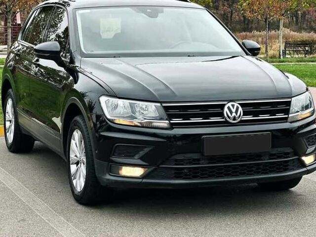 Чорний Фольксваген Тігуан, об'ємом двигуна 2 л та пробігом 150 тис. км за 23000 $, фото 1 на Automoto.ua
