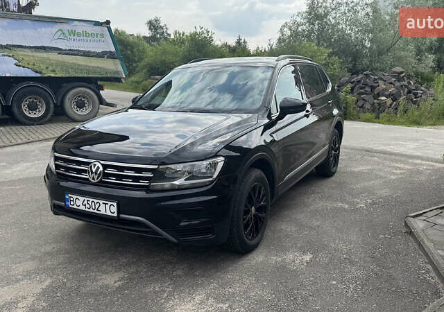 Чорний Фольксваген Тігуан, об'ємом двигуна 1.98 л та пробігом 62 тис. км за 17950 $, фото 1 на Automoto.ua