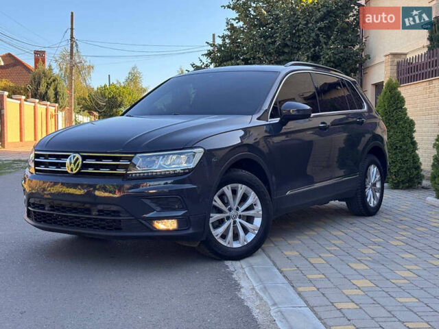 Чорний Фольксваген Тігуан, об'ємом двигуна 1.98 л та пробігом 96 тис. км за 24300 $, фото 1 на Automoto.ua