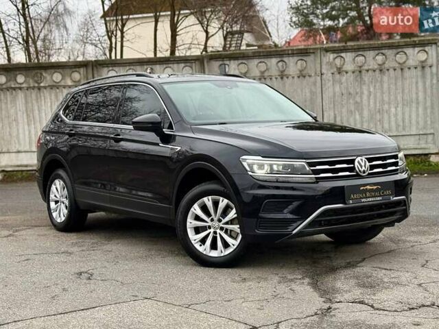 Черный Фольксваген Тигуан, объемом двигателя 2 л и пробегом 176 тыс. км за 19500 $, фото 1 на Automoto.ua