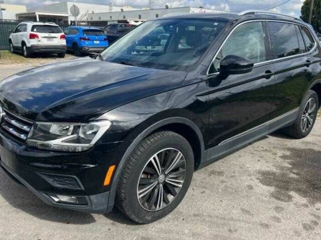 Чорний Фольксваген Тігуан, об'ємом двигуна 2 л та пробігом 34 тис. км за 4600 $, фото 1 на Automoto.ua