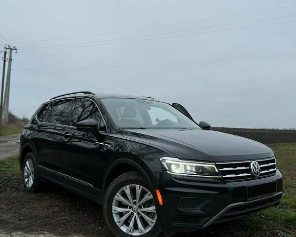 Чорний Фольксваген Тігуан, об'ємом двигуна 1.98 л та пробігом 78 тис. км за 23500 $, фото 1 на Automoto.ua