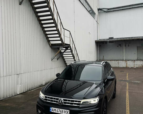 Чорний Фольксваген Тігуан, об'ємом двигуна 1.98 л та пробігом 101 тис. км за 19600 $, фото 1 на Automoto.ua