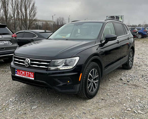 Черный Фольксваген Тигуан, объемом двигателя 2 л и пробегом 183 тыс. км за 19600 $, фото 1 на Automoto.ua