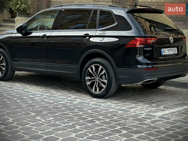 Черный Фольксваген Тигуан, объемом двигателя 2 л и пробегом 55 тыс. км за 19800 $, фото 1 на Automoto.ua