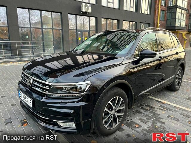 Черный Фольксваген Тигуан, объемом двигателя 2 л и пробегом 133 тыс. км за 22000 $, фото 1 на Automoto.ua