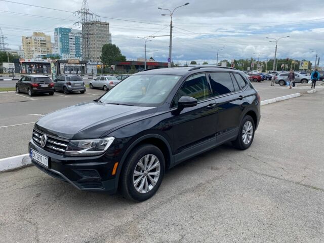 Чорний Фольксваген Тігуан, об'ємом двигуна 2 л та пробігом 66 тис. км за 19499 $, фото 1 на Automoto.ua