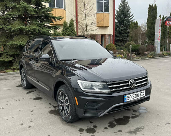 Черный Фольксваген Тигуан, объемом двигателя 2 л и пробегом 130 тыс. км за 18500 $, фото 1 на Automoto.ua