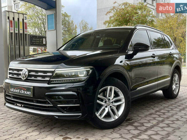 Черный Фольксваген Тигуан, объемом двигателя 1.98 л и пробегом 170 тыс. км за 22499 $, фото 1 на Automoto.ua
