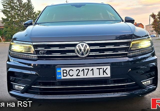 Чорний Фольксваген Тігуан, об'ємом двигуна 2 л та пробігом 237 тис. км за 27900 $, фото 1 на Automoto.ua