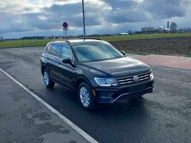 Черный Фольксваген Тигуан, объемом двигателя 2 л и пробегом 76 тыс. км за 9300 $, фото 1 на Automoto.ua