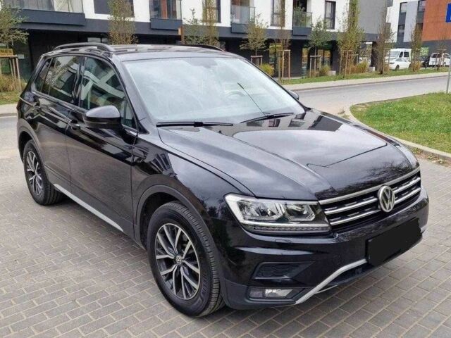 Черный Фольксваген Тигуан, объемом двигателя 2 л и пробегом 103 тыс. км за 15000 $, фото 1 на Automoto.ua