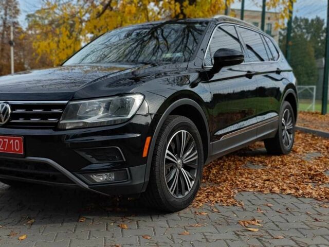 Черный Фольксваген Тигуан, объемом двигателя 2 л и пробегом 314 тыс. км за 14700 $, фото 1 на Automoto.ua
