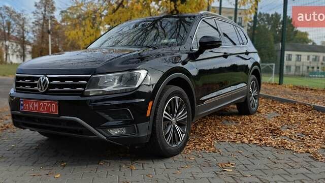 Чорний Фольксваген Тігуан, об'ємом двигуна 1.98 л та пробігом 314 тис. км за 15200 $, фото 1 на Automoto.ua