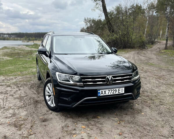 Черный Фольксваген Тигуан, объемом двигателя 1.98 л и пробегом 129 тыс. км за 18500 $, фото 1 на Automoto.ua