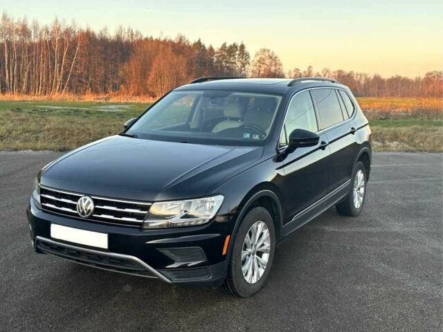 Черный Фольксваген Тигуан, объемом двигателя 2 л и пробегом 109 тыс. км за 11800 $, фото 1 на Automoto.ua