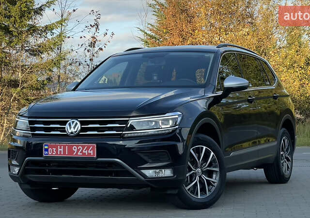 Черный Фольксваген Тигуан, объемом двигателя 2 л и пробегом 170 тыс. км за 18799 $, фото 1 на Automoto.ua