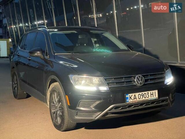 Черный Фольксваген Тигуан, объемом двигателя 2 л и пробегом 107 тыс. км за 19900 $, фото 1 на Automoto.ua