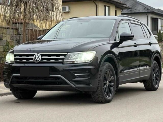 Черный Фольксваген Тигуан, объемом двигателя 2 л и пробегом 184 тыс. км за 18500 $, фото 1 на Automoto.ua