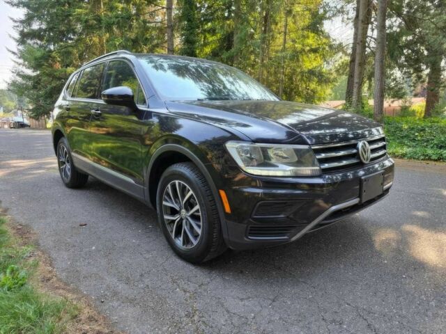Черный Фольксваген Тигуан, объемом двигателя 2 л и пробегом 42 тыс. км за 17200 $, фото 1 на Automoto.ua