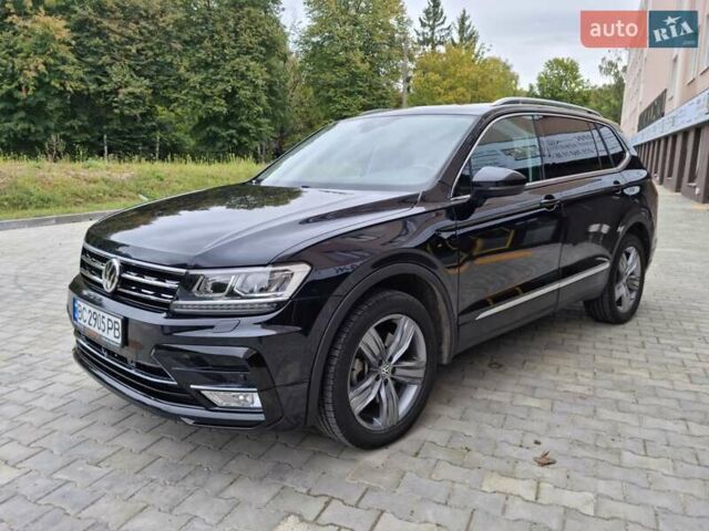 Черный Фольксваген Тигуан, объемом двигателя 2 л и пробегом 58 тыс. км за 26900 $, фото 1 на Automoto.ua
