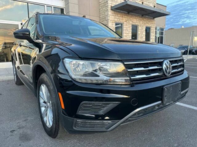 Черный Фольксваген Тигуан, объемом двигателя 2 л и пробегом 39 тыс. км за 8900 $, фото 1 на Automoto.ua