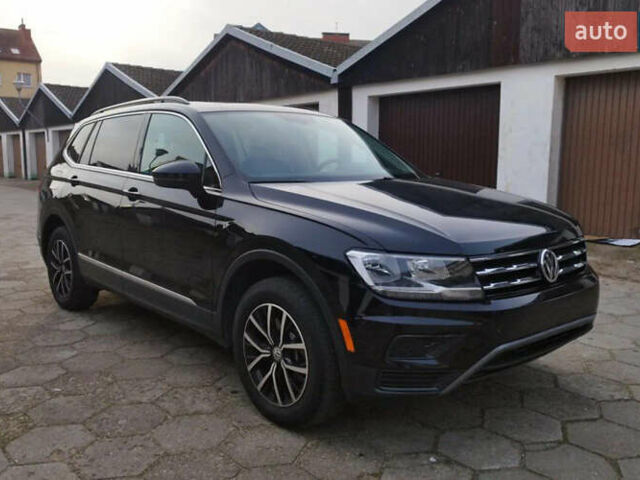 Черный Фольксваген Тигуан, объемом двигателя 2 л и пробегом 96 тыс. км за 16300 $, фото 1 на Automoto.ua