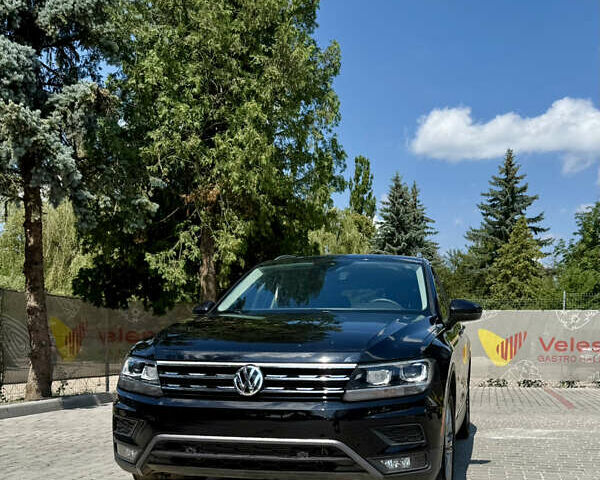 Черный Фольксваген Тигуан, объемом двигателя 1.98 л и пробегом 128 тыс. км за 23000 $, фото 1 на Automoto.ua