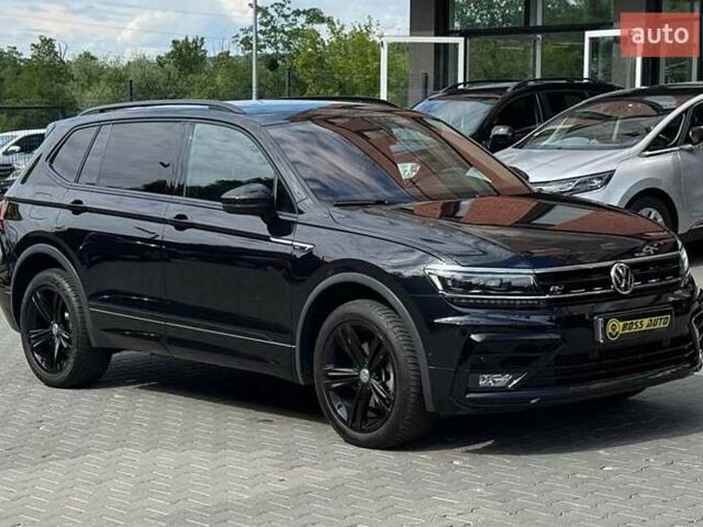 Черный Фольксваген Тигуан, объемом двигателя 2 л и пробегом 124 тыс. км за 36500 $, фото 1 на Automoto.ua