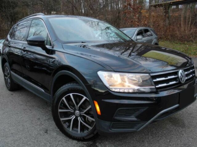 Черный Фольксваген Тигуан, объемом двигателя 2 л и пробегом 15 тыс. км за 17000 $, фото 1 на Automoto.ua