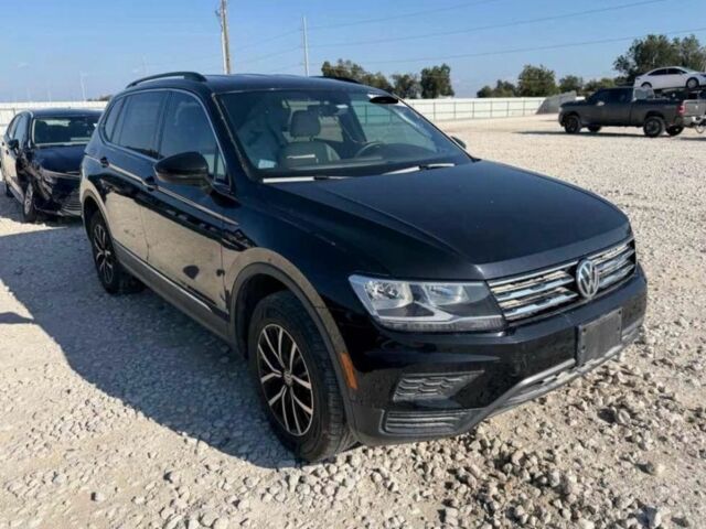Черный Фольксваген Тигуан, объемом двигателя 2 л и пробегом 75 тыс. км за 14500 $, фото 1 на Automoto.ua