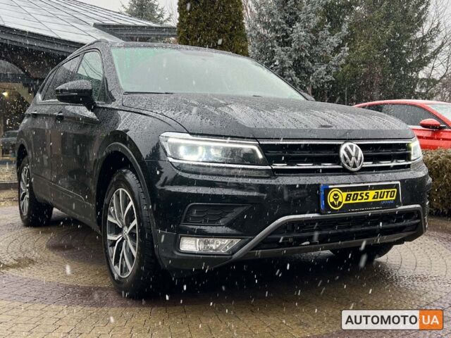 Чорний Фольксваген Тігуан, об'ємом двигуна 2 л та пробігом 37 тис. км за 25800 $, фото 1 на Automoto.ua