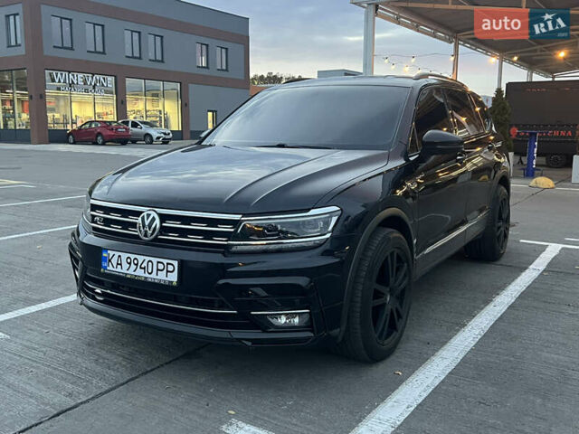 Чорний Фольксваген Тігуан, об'ємом двигуна 2 л та пробігом 56 тис. км за 23700 $, фото 1 на Automoto.ua