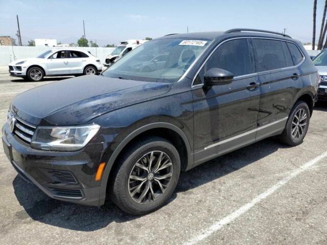 Чорний Фольксваген Тігуан, об'ємом двигуна 2 л та пробігом 75 тис. км за 3800 $, фото 1 на Automoto.ua