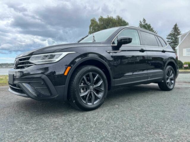 Черный Фольксваген Тигуан, объемом двигателя 2 л и пробегом 12 тыс. км за 13000 $, фото 1 на Automoto.ua