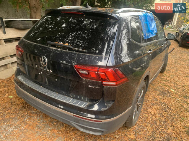 Черный Фольксваген Тигуан, объемом двигателя 2 л и пробегом 12 тыс. км за 14000 $, фото 1 на Automoto.ua