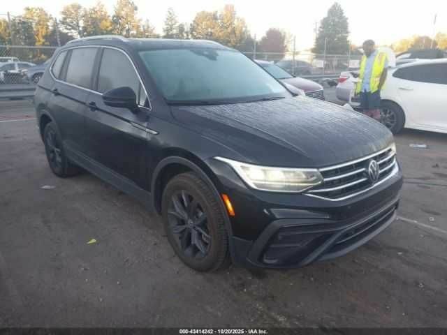 Чорний Фольксваген Тігуан, об'ємом двигуна 2 л та пробігом 16 тис. км за 8000 $, фото 1 на Automoto.ua