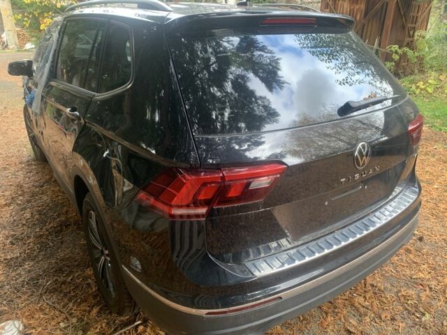 Чорний Фольксваген Тігуан, об'ємом двигуна 2 л та пробігом 14 тис. км за 12900 $, фото 1 на Automoto.ua